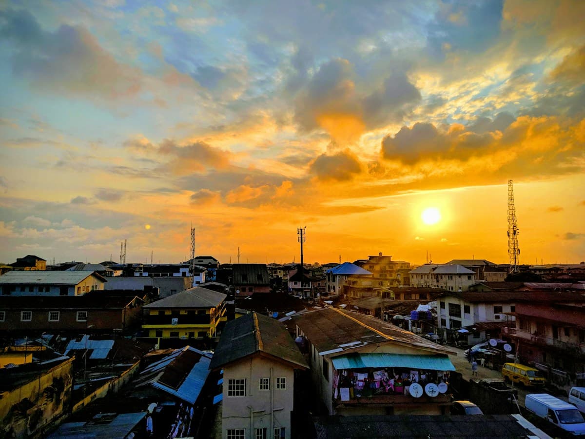 Rooftops of a busy neighbourhood in Lagos at sunset
